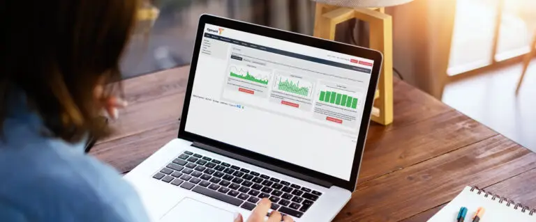 A person using SmartHub on a laptop to manage their Tipmont account
